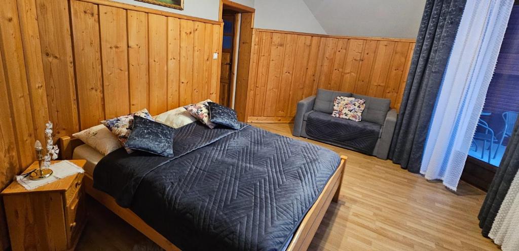 En eller flere senge i et værelse på Maria Chyc wynajem pokoi gościnnych