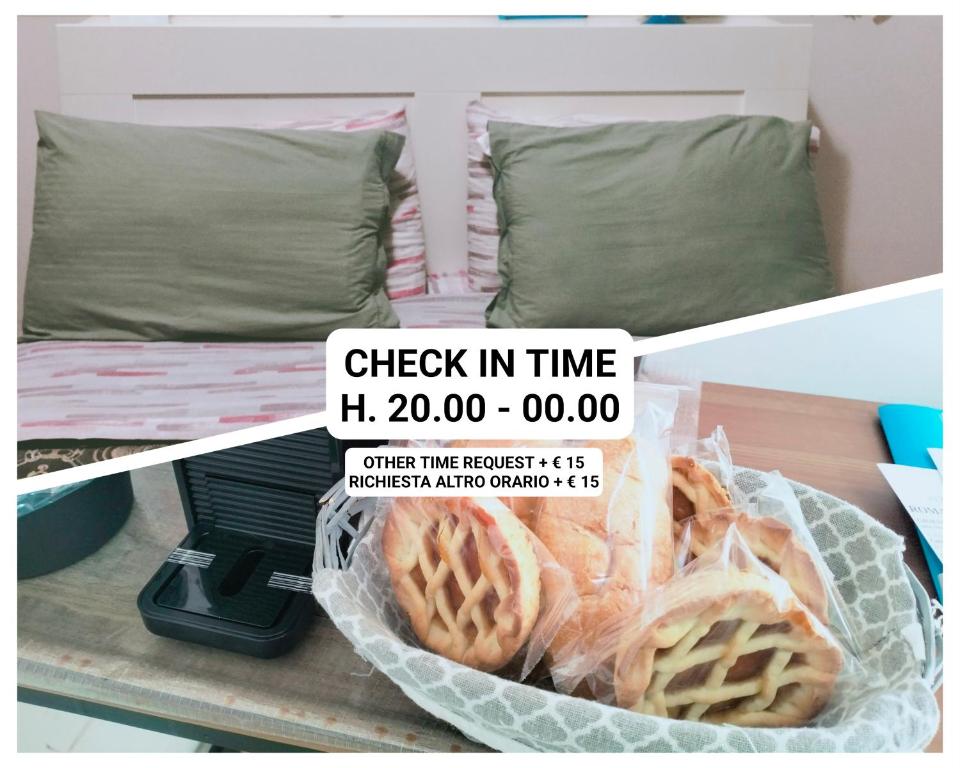 Una cama o camas en una habitación de La Perla B & B