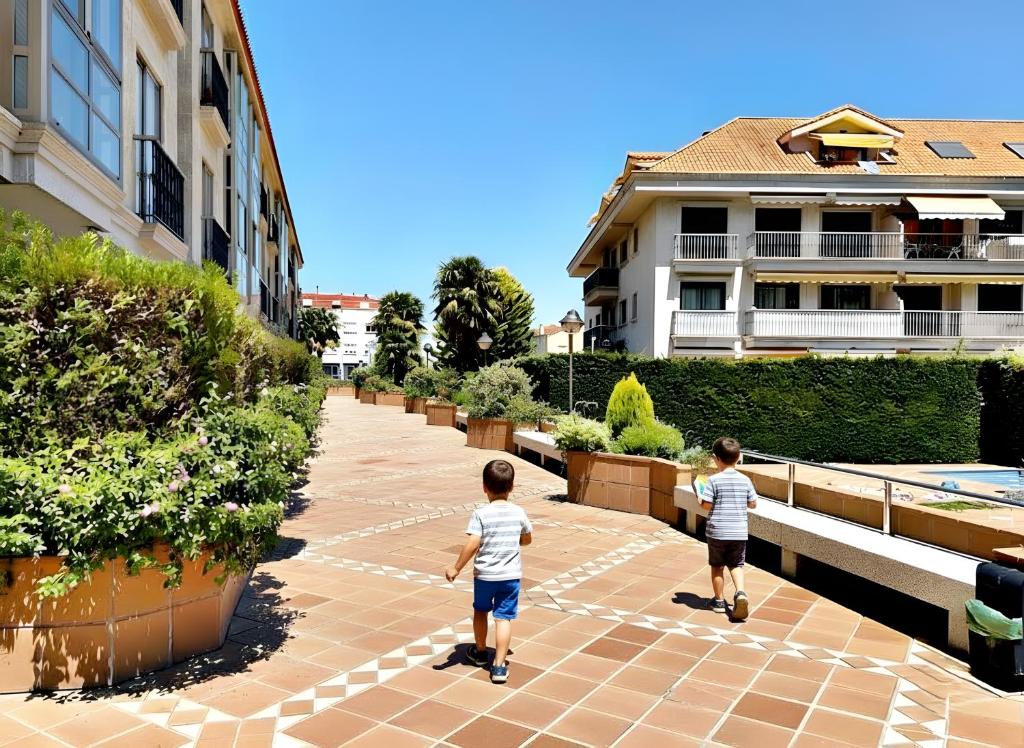 two young boys walking down a brick sidewalk at Holibai, Chuliña, Vacaciones Familiares en Baiona, Espacio, Piscina y Playa a un Paseo in Baiona