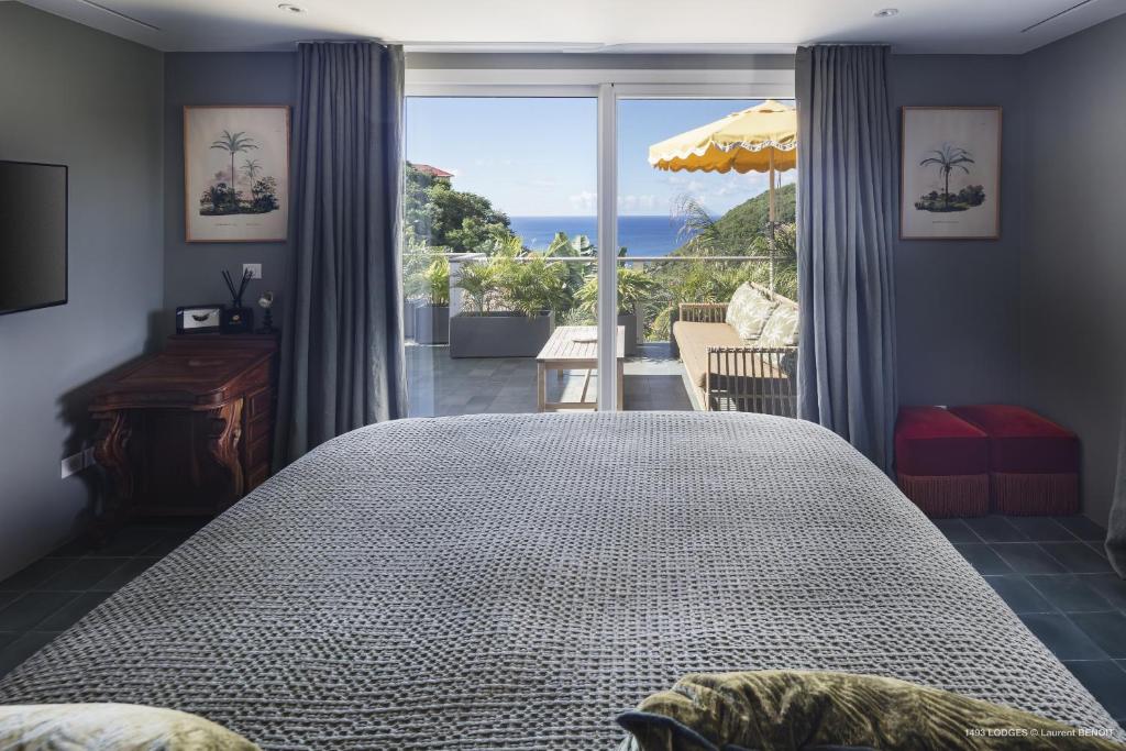 Postel nebo postele na pokoji v ubytování Villa 1493