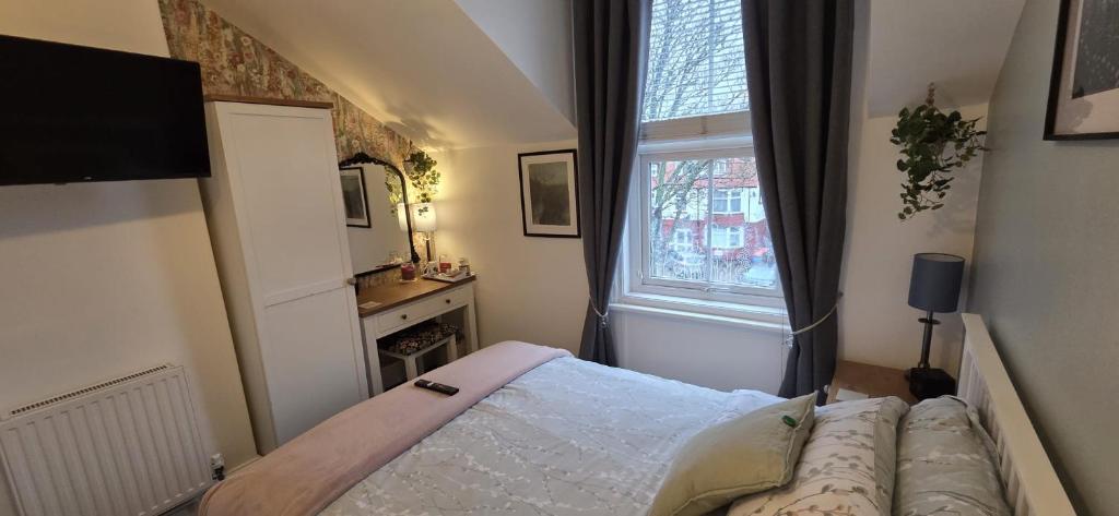 Ένα ή περισσότερα κρεβάτια σε δωμάτιο στο St Michael's Guest House