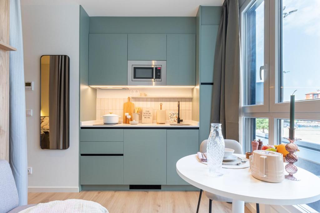 Kuchyň nebo kuchyňský kout v ubytování Be Casa Barakaldo