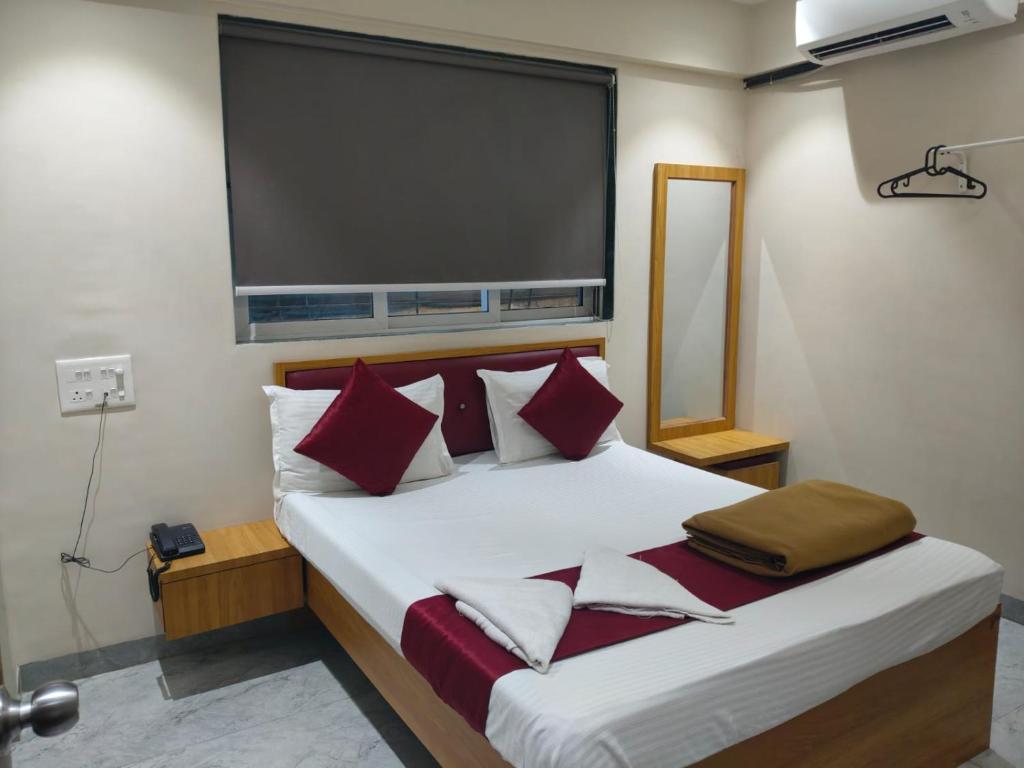 Ένα ή περισσότερα κρεβάτια σε δωμάτιο στο Palm lodging and boarding