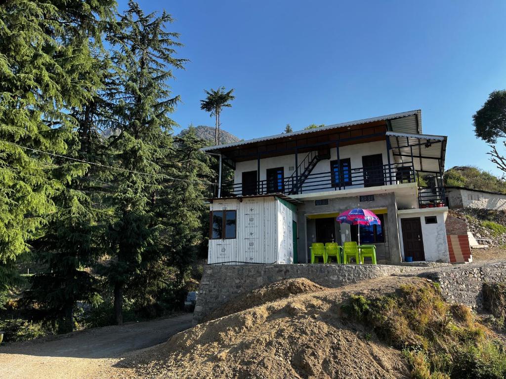a house on top of a pile of dirt at Sawra Homestay in Chakrāta