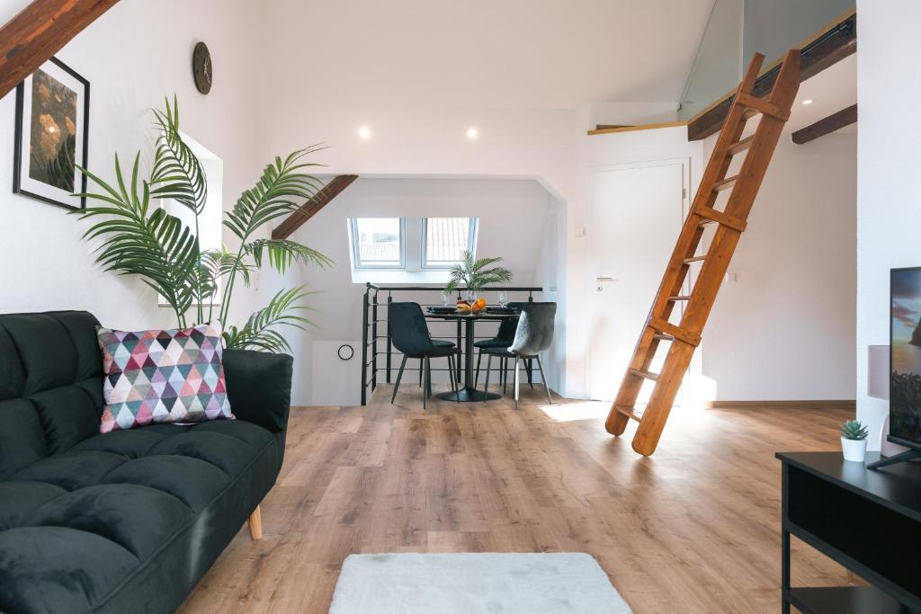 Posezení v ubytování City Apartment