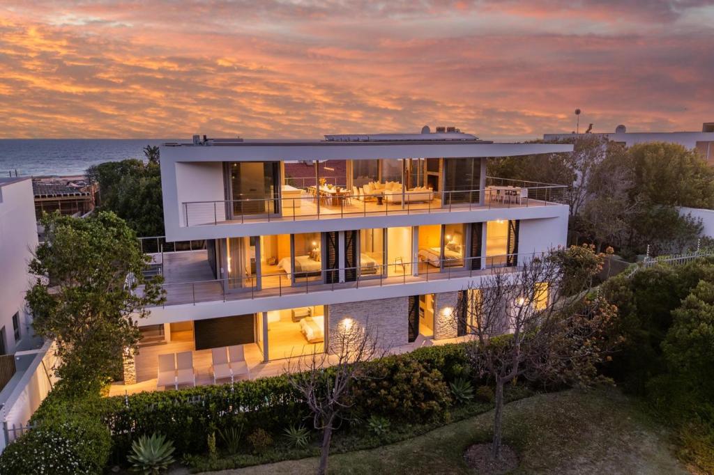 an aerial view of a house with the ocean in the background at Ocean View Villa - Keurboomstrand in Plettenberg Bay
