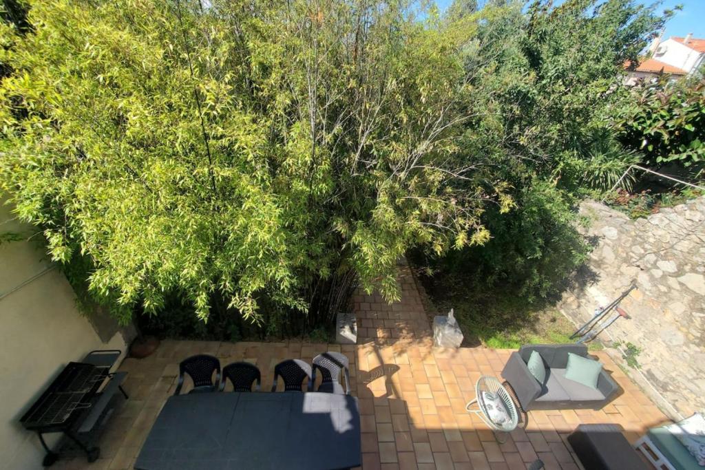 Zahrada ubytování L'amandier - Maison avec jardin sans vis à vis