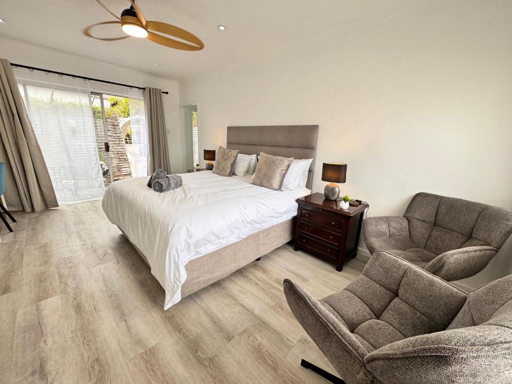 Postel nebo postele na pokoji v ubytování 55 Albatross Guesthouse