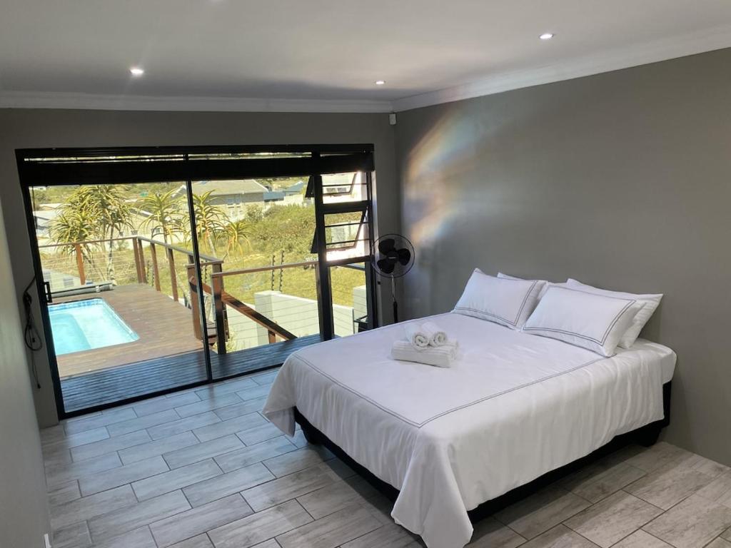 En eller flere senge i et værelse på City and Sea 1-4 Guests