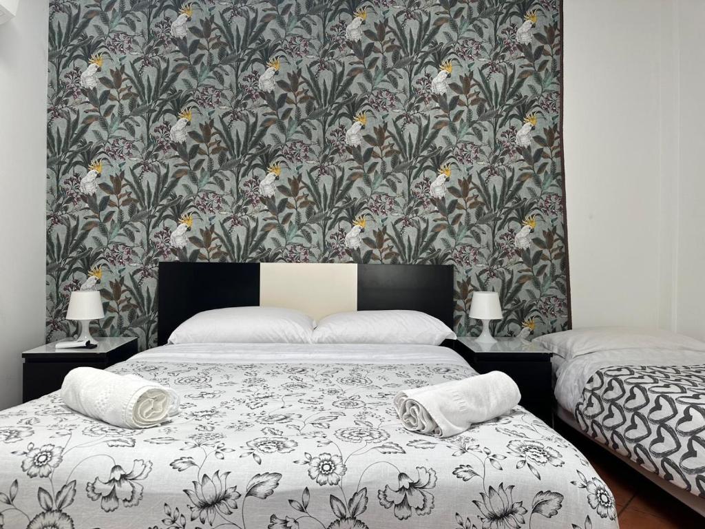 Кровать или кровати в номере Casa Felice a piazza Zama