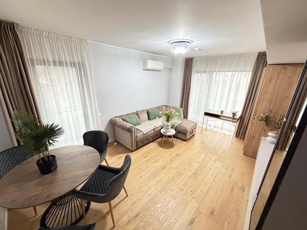 Et opholdsområde på Luxury Glam Apartments Unique Building near Palas