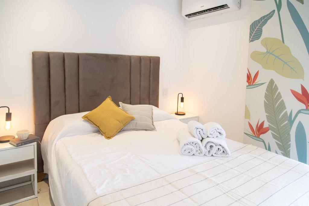 Ένα ή περισσότερα κρεβάτια σε δωμάτιο στο Paraíso-Perfecto para 2-Pileta-Zona estratégica