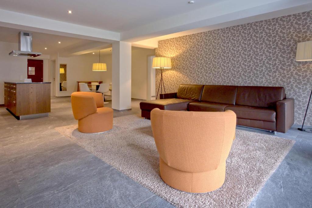 Χώρος καθιστικού στο Apartment JungfrauCenter Schynige Platte - GRIWA RENT AG