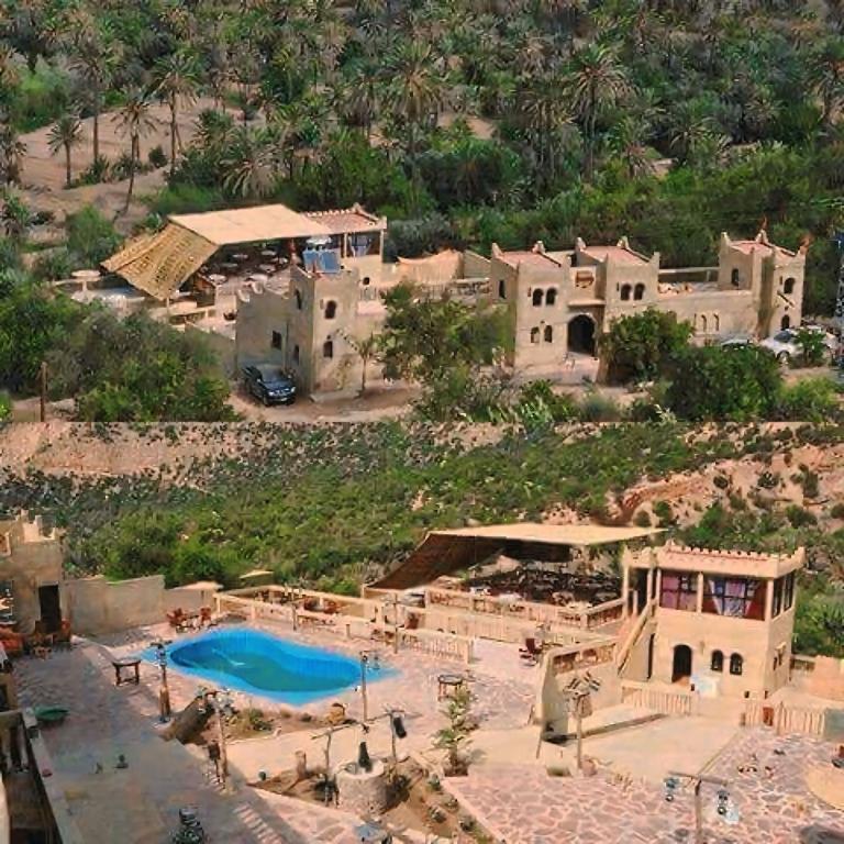 an aerial view of a house and a swimming pool at Auberge jawahir aguerd paradise valley in Aguerd