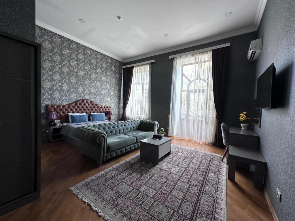 TV a/nebo společenská místnost v ubytování Pilot Boutique Hotel