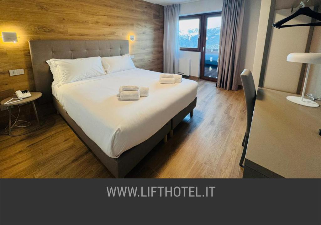Ένα ή περισσότερα κρεβάτια σε δωμάτιο στο Lift Hotel