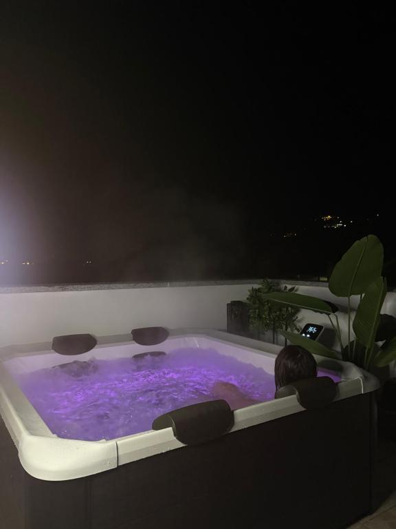 Bazén v ubytování Terrazza Domese nebo v jeho okolí