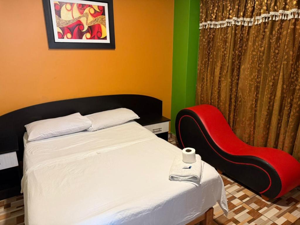 Postel nebo postele na pokoji v ubytování Hostal Nocheros