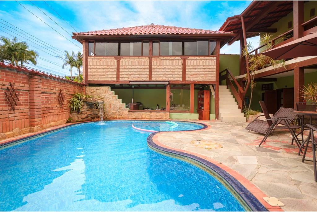 Bazén v ubytování VELINN Pousada Kyrios nebo v jeho okolí