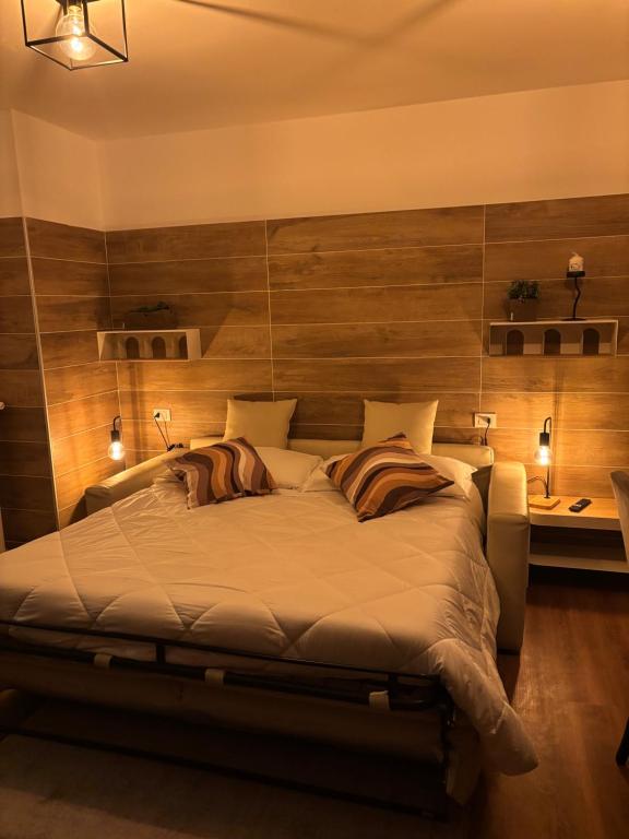 Una cama o camas en una habitación de Apart Hotel Atlantic