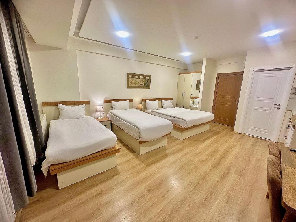 En eller flere senge i et værelse på Valence Boutique Hotel Istanbul Taksim