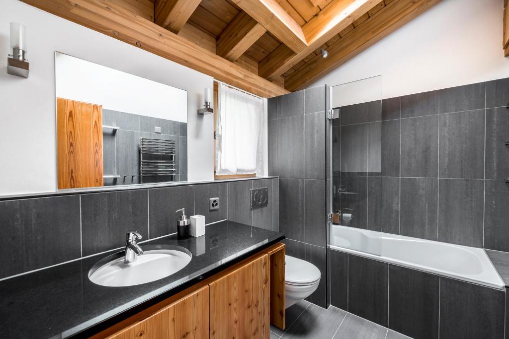 Koupelna v ubytování Ari Resort Apartments