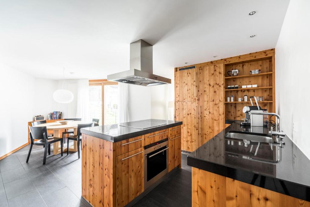 Kuchyň nebo kuchyňský kout v ubytování Ari Resort Apartments