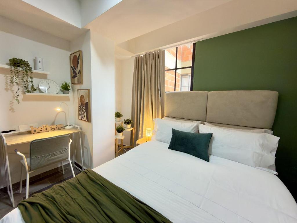 Postel nebo postele na pokoji v ubytování BIT by Simple stay