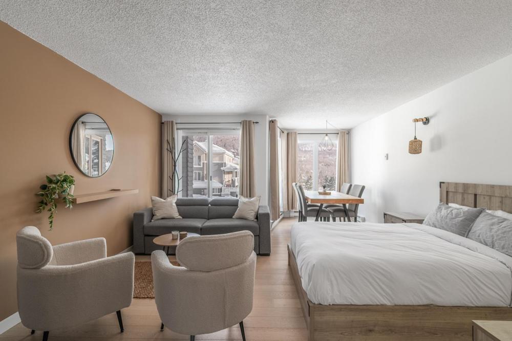 Giường trong phòng chung tại Hameau 22-51 Studio