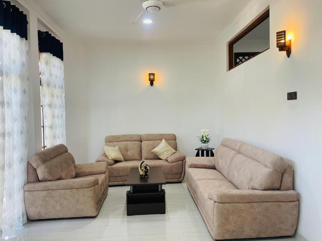 Χώρος καθιστικού στο Amity Villa