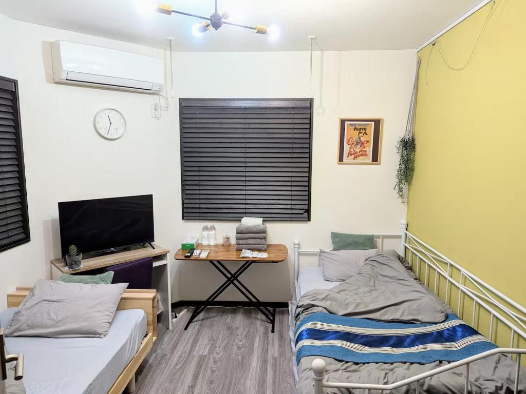 Μια τηλεόραση ή/και κέντρο ψυχαγωγίας στο ランドリーデザインハウス