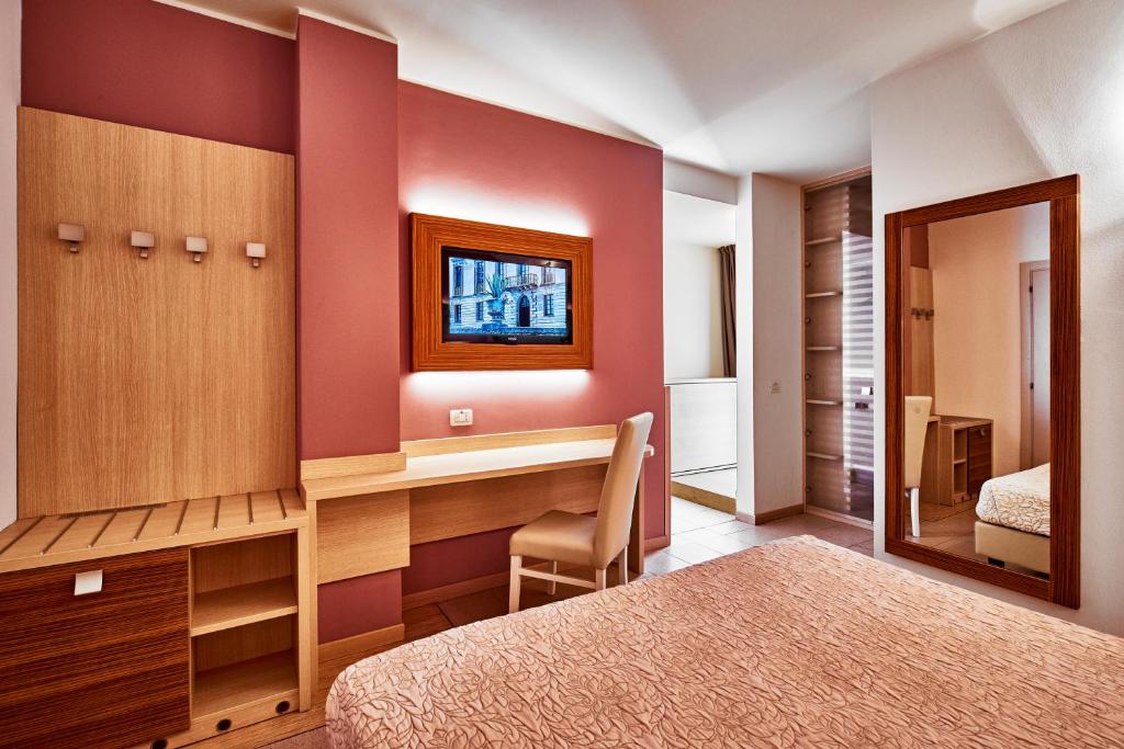 Postel nebo postele na pokoji v ubytování Palace Hotel Regina