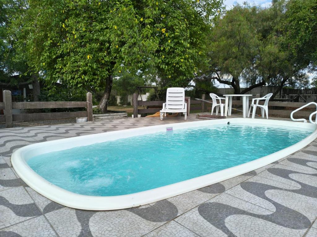 Πισίνα στο ή κοντά στο Pousada Espírito Santo - Estamos ubicados a solo 100 metros de la Ruta BR-290