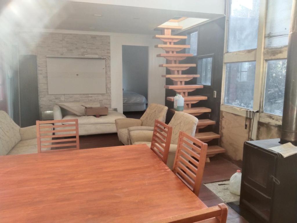 Posezení v ubytování Cabaña melinka y Cabaña Grande