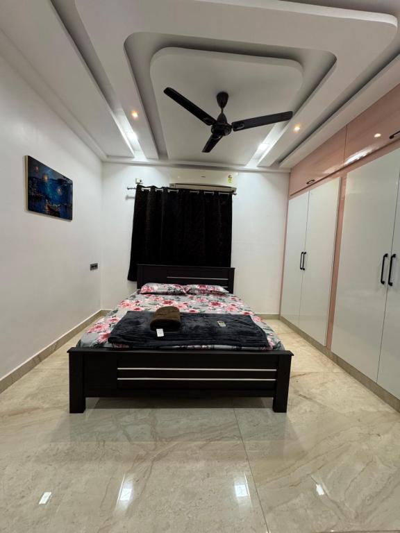 Ένα ή περισσότερα κρεβάτια σε δωμάτιο στο ARK Liv Inn