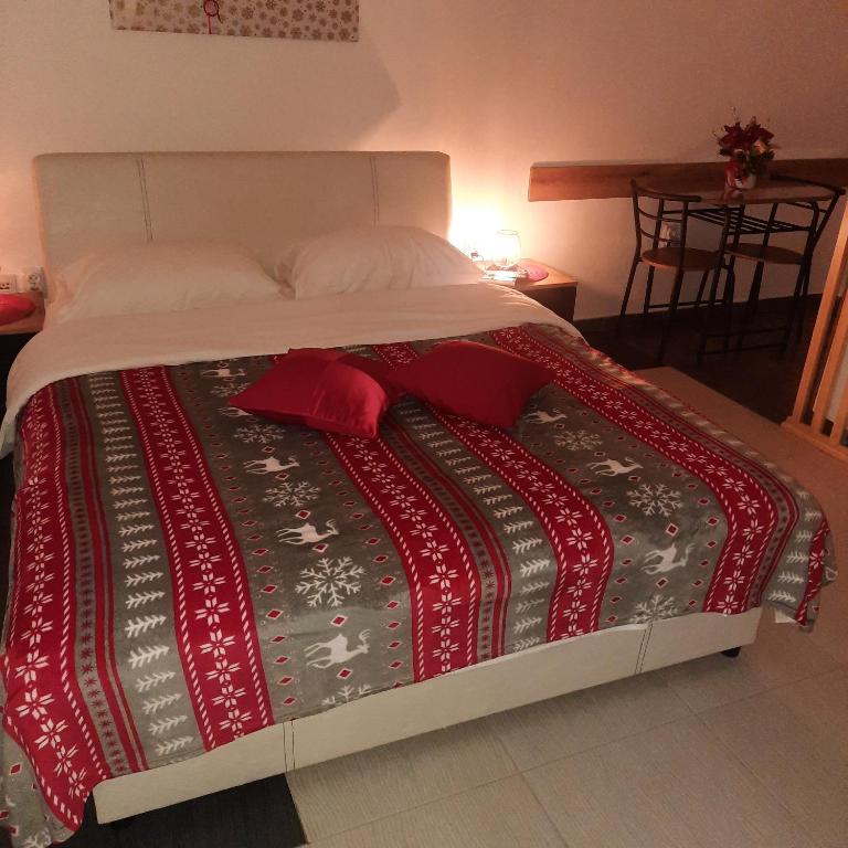 Ένα ή περισσότερα κρεβάτια σε δωμάτιο στο AGAPE