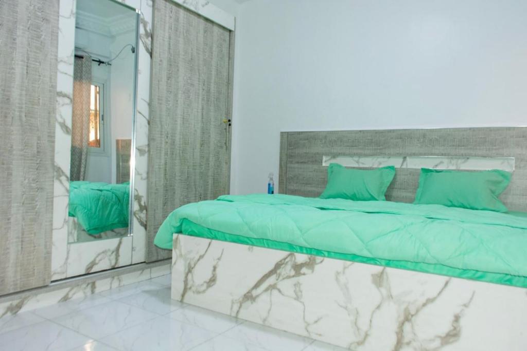 Giường trong phòng chung tại Top luxe