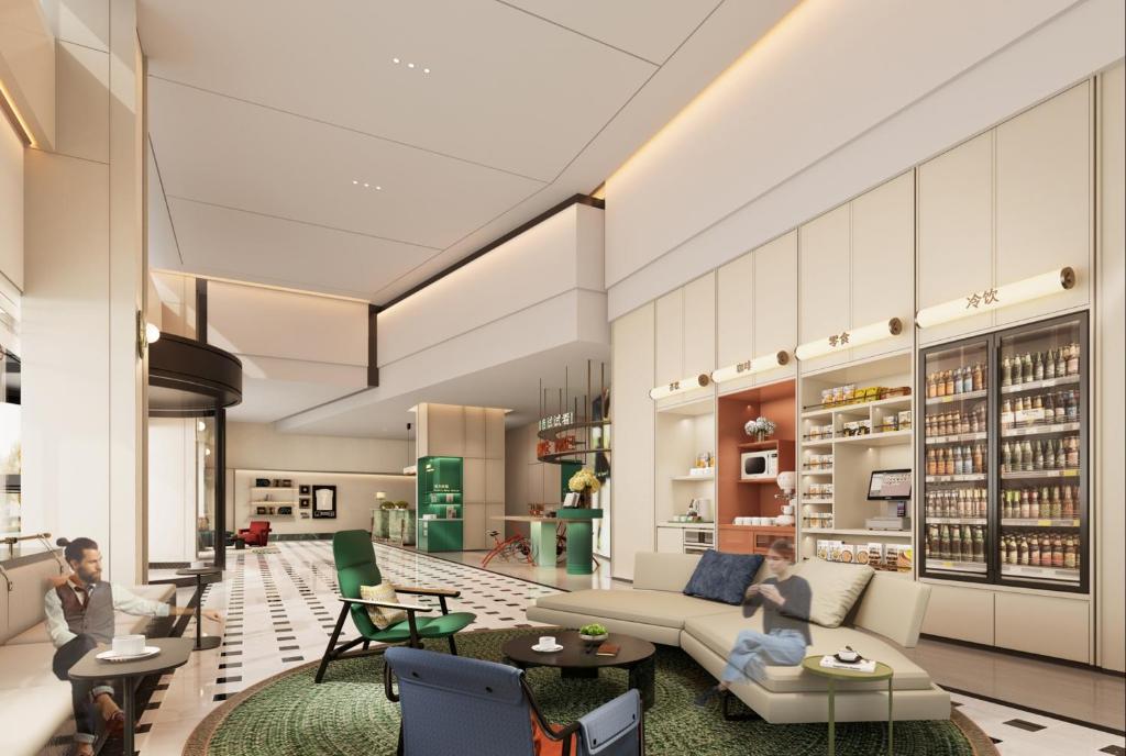 a living room with a couch and chairs and tables at EVEN Hotel Chengdu Phoenix Mountain by IHG in Chengdu