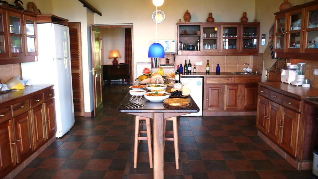 Kuchyň nebo kuchyňský kout v ubytování Rangala House