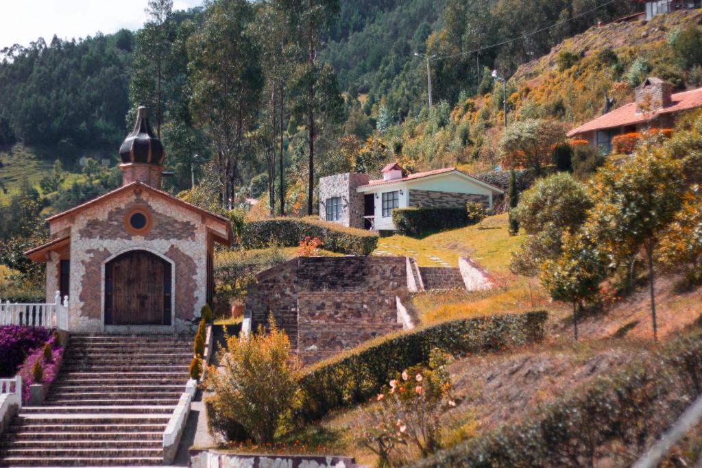 a small church on a hill with some stairs at Villa Germana in Paipa