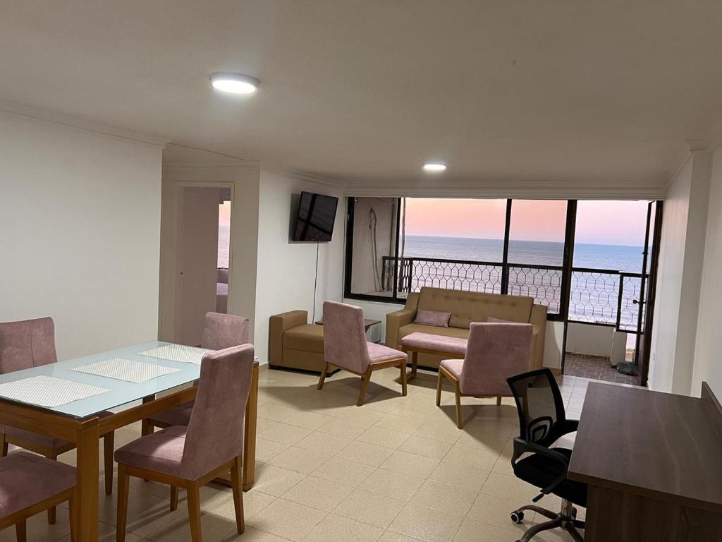 Et opholdsområde på R11 Riohacha lindo, cómodo y seguro apartamento con balcón mirando el mar
