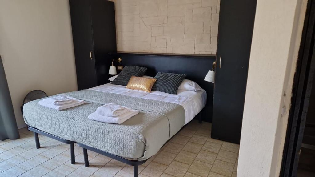 Postel nebo postele na pokoji v ubytování Hotel ambra milano