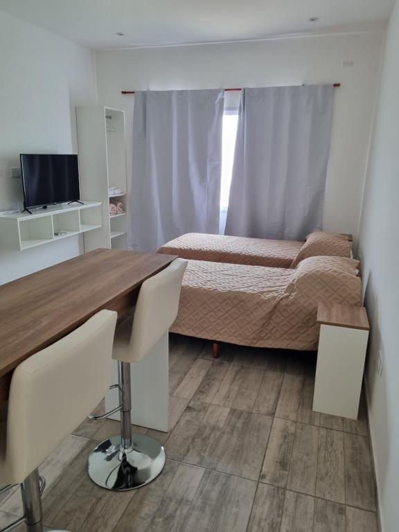 Et tv og/eller underholdning på Mirasoles Suites