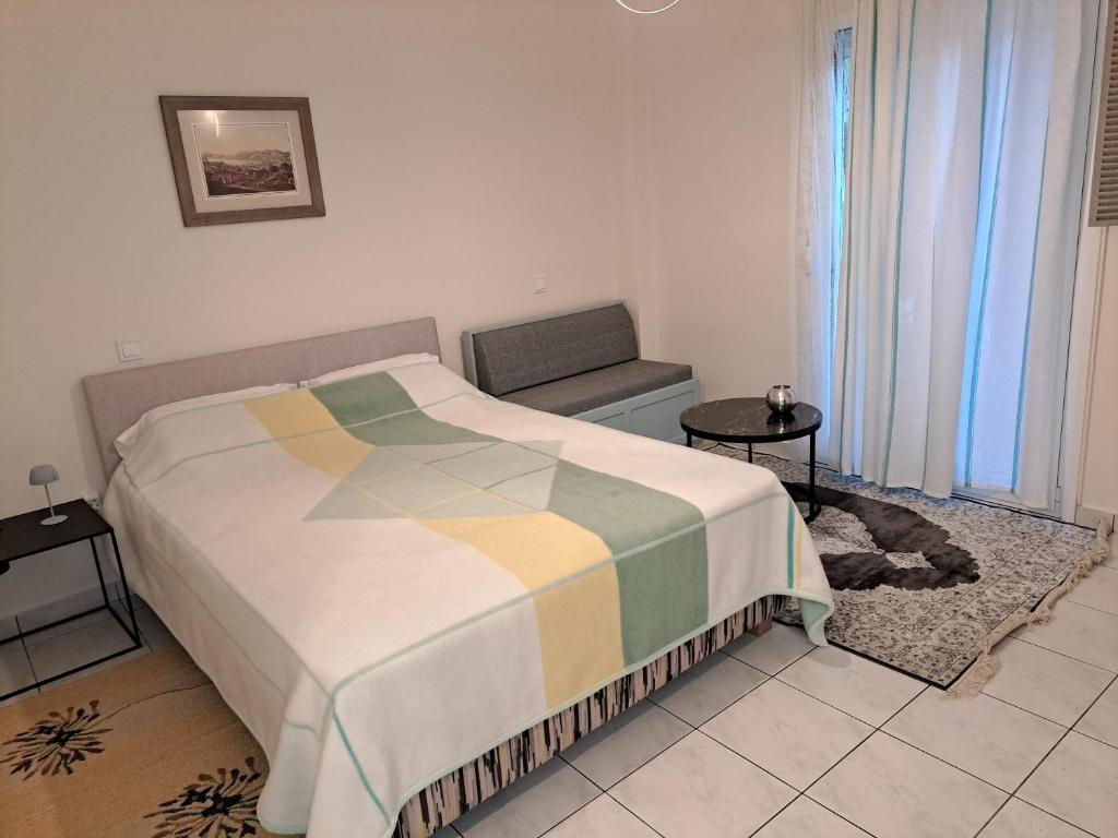 Ένα ή περισσότερα κρεβάτια σε δωμάτιο στο Cozy Corner Melandra