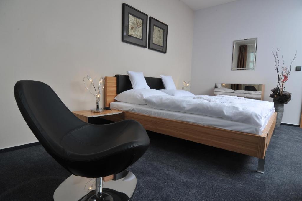 Postel nebo postele na pokoji v ubytování Pension Milk Inn