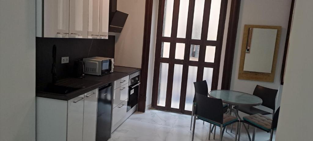 Кухня или мини-кухня в City Haven Palma
