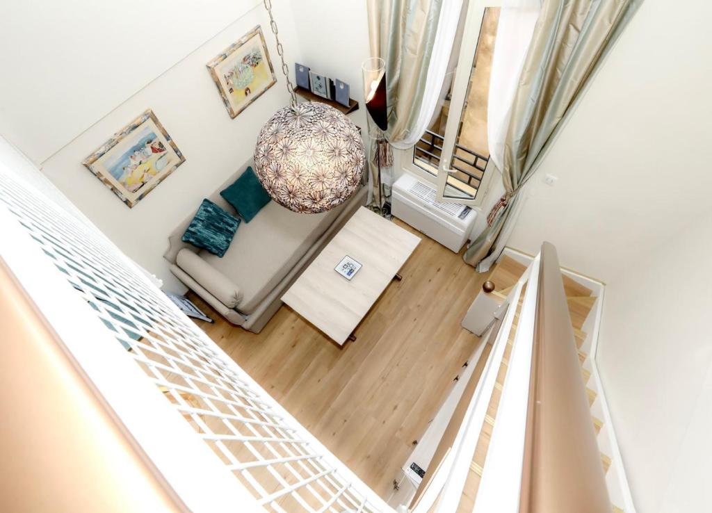 an overhead view of a living room with at Loft Moderne - À Deux Pas de Monte-Carlo in Roquebrune-Cap-Martin