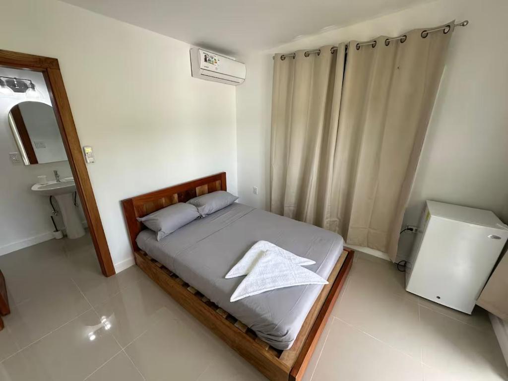 Postel nebo postele na pokoji v ubytování Villa Rio Grande