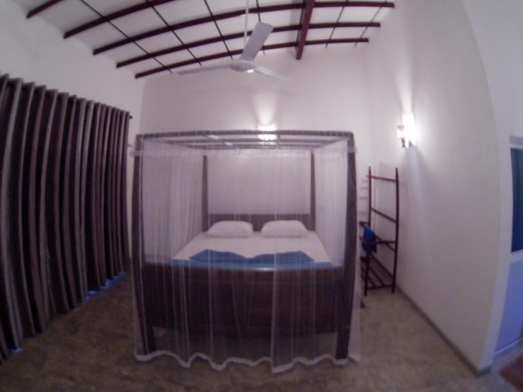 Postel nebo postele na pokoji v ubytování Mirissa Eco Hills