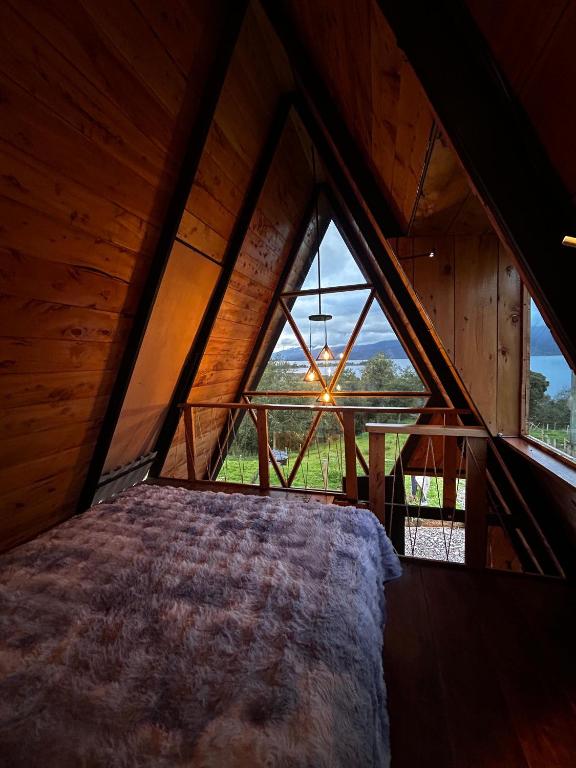 Una cama o camas en una habitación de TerrraVerde Chalet